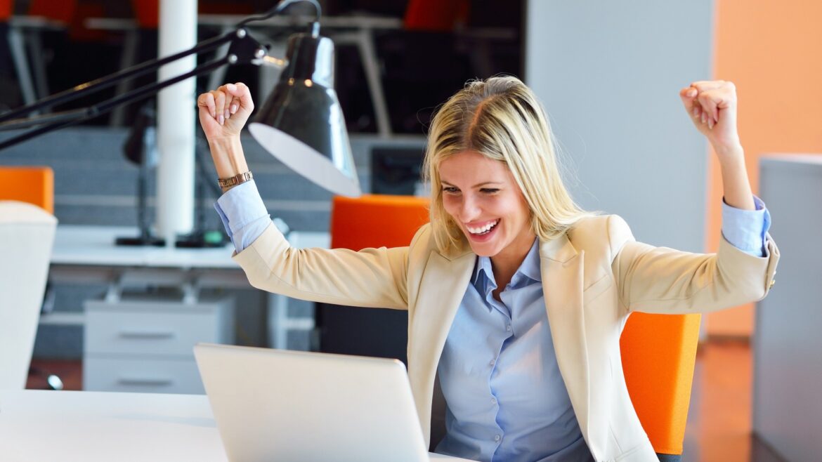 Successful business woman and man working at the office